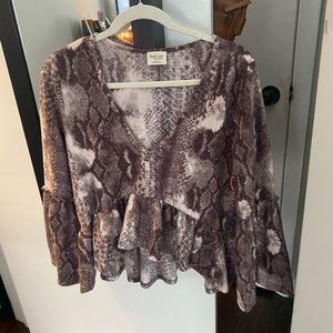 Brooklyn’s snakeskin sweater